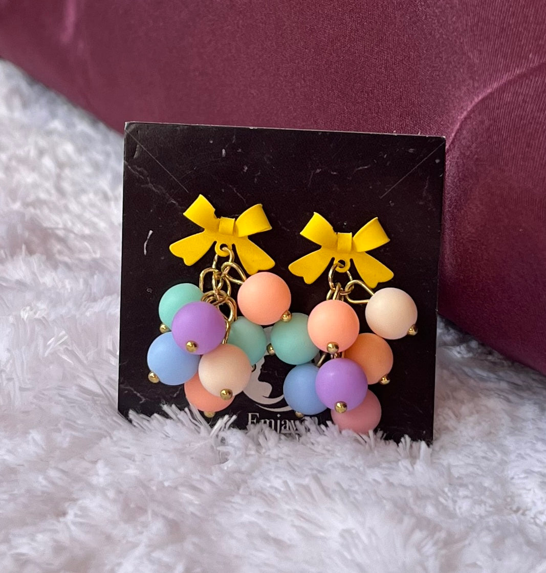 Yellow bow dangles