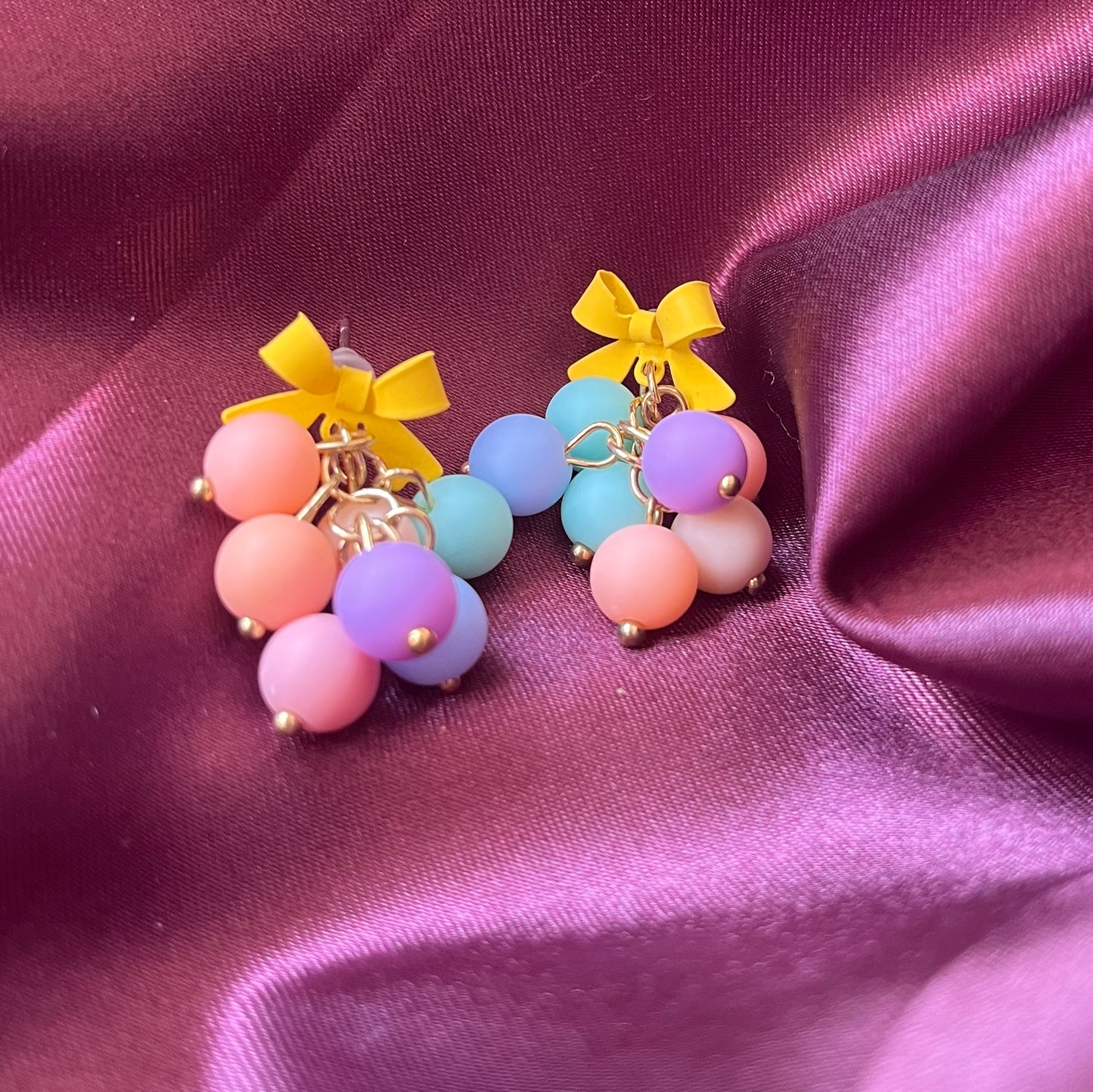 Yellow bow dangles