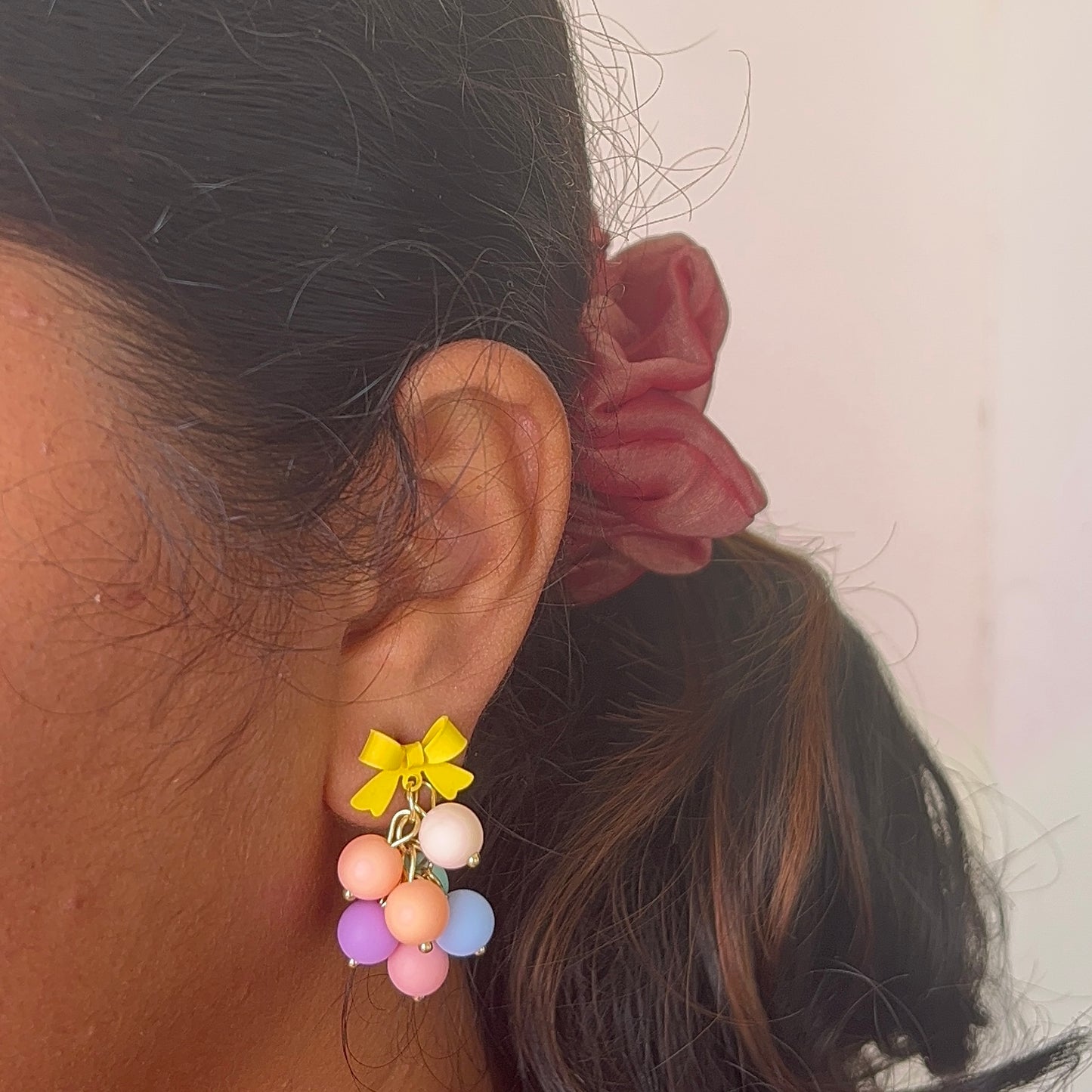 Yellow bow dangles