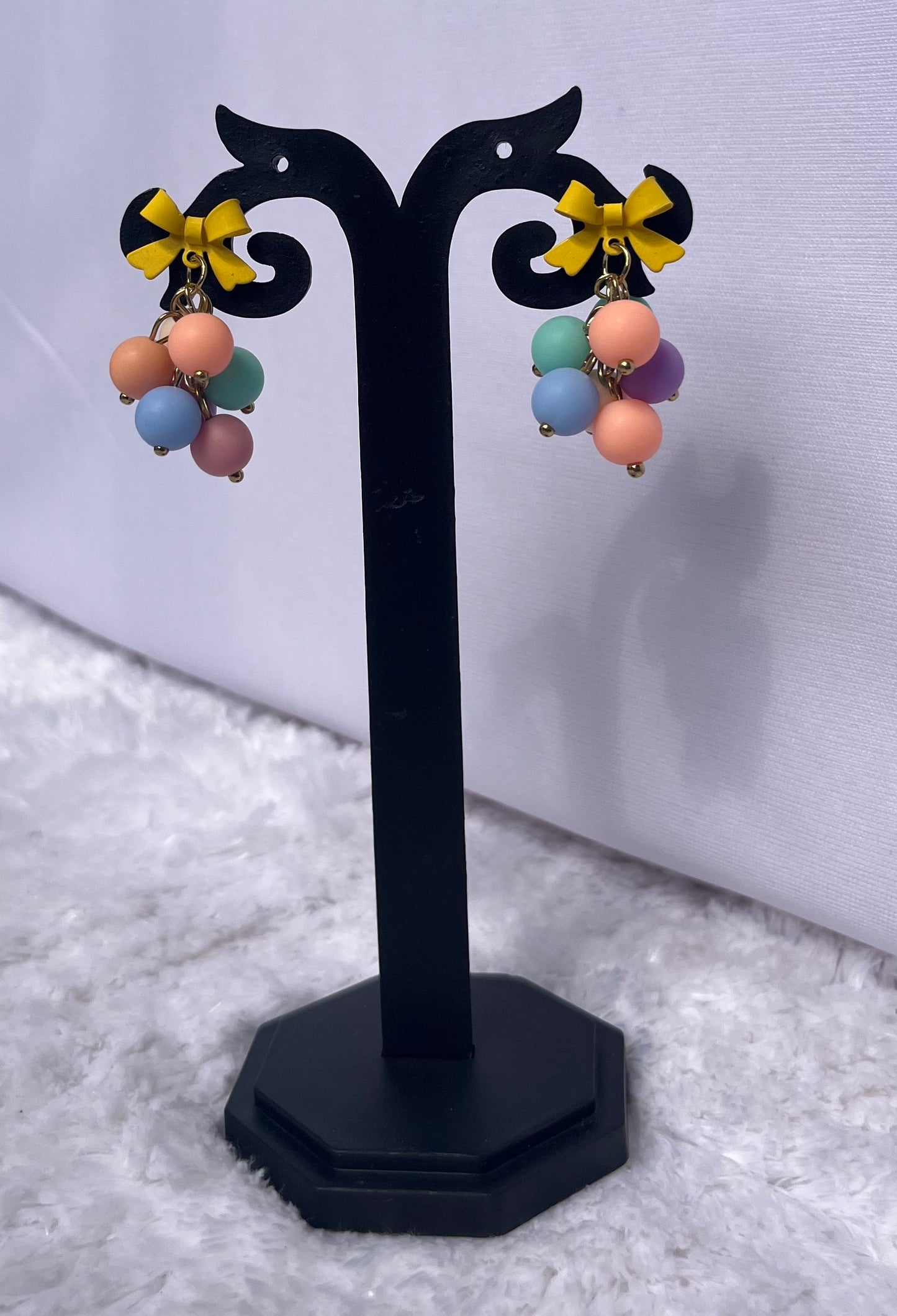 Yellow bow dangles