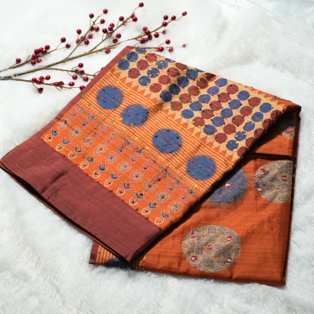 Semi Tussar saree with knots and mirror work