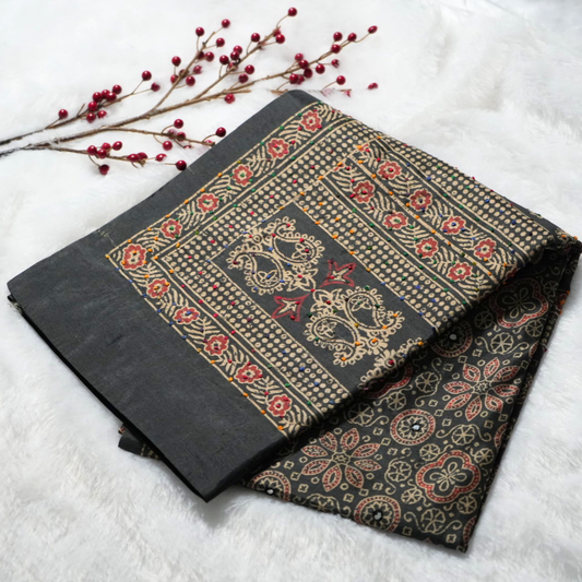 Semi Tussar saree with knots and mirror work